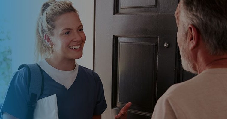 man greeting young female podiatrist at home